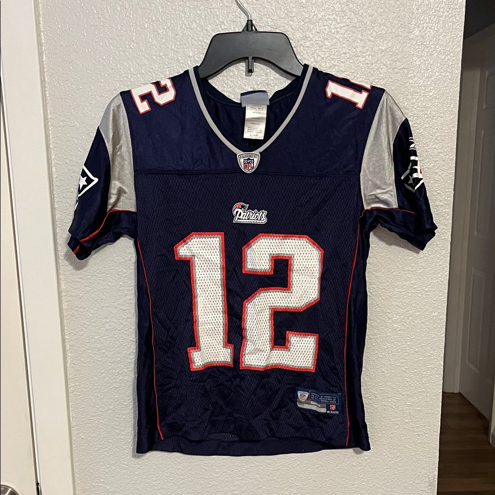 Reebok Woman’s Patriots Tom Brady Jersey.